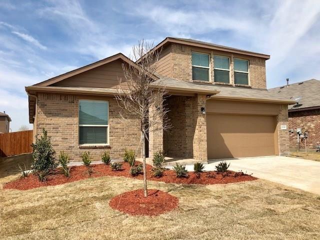 9105 Edenberry Ln, Fort Worth, TX 76179 - view of front of property with brick siding, an attached garage, and concrete driveway