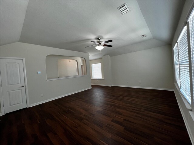 9105 Edenberry Ln, Fort Worth, TX 76179 - bonus room with lofted ceiling, a ceiling fan, dark wood-style flooring, and baseboards