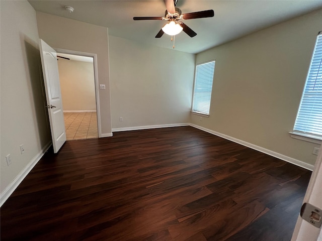 9105 Edenberry Ln, Fort Worth, TX 76179 - spare room featuring ceiling fan, dark wood-style flooring, a smoke detector, and baseboards
