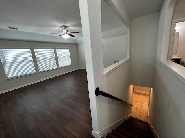 9105 Edenberry Ln, Fort Worth, TX 76179 - stairs with ceiling fan, wood finished floors, and baseboards