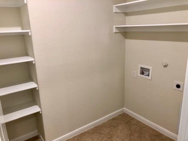 9105 Edenberry Ln, Fort Worth, TX 76179 - laundry area with hookup for an electric dryer, washer hookup, hookup for a gas dryer, and baseboards