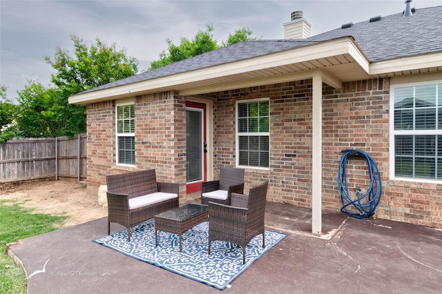 390 Sugarberry Ave, Abilene, TX 79602 - view of patio with fence and outdoor lounge area