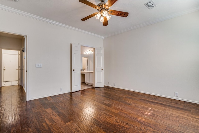 unfurnished bedroom with dark wood finished floors, crown molding, baseboards, and a ceiling fan