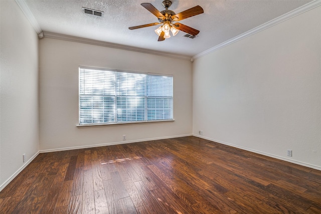 spare room with hardwood / wood-style floors, ceiling fan, ornamental molding, a textured ceiling, and baseboards