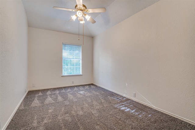 empty room with carpet floors, ceiling fan, and baseboards
