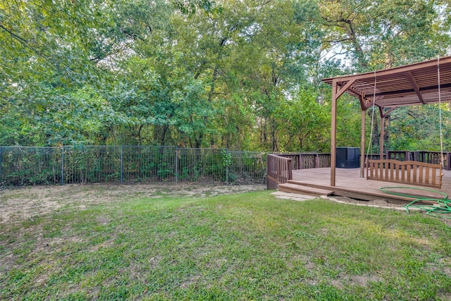 view of yard with a wooden deck