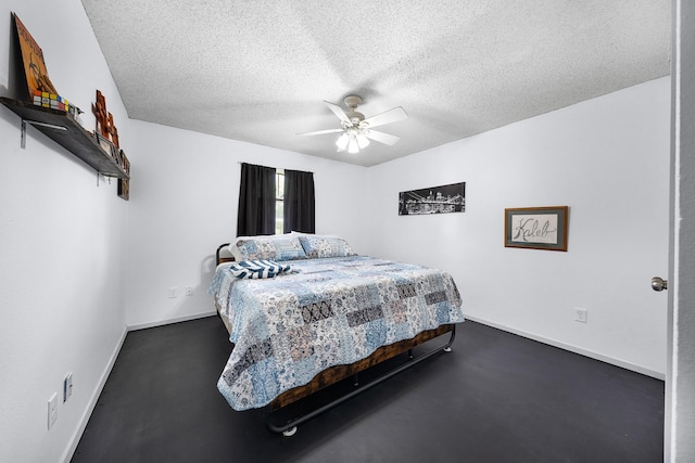 400 Houston St, Sulphur Springs, TX 75482 - bedroom with a textured ceiling, baseboards, and a ceiling fan