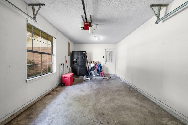 400 Houston St, Sulphur Springs, TX 75482 - garage featuring a garage door opener