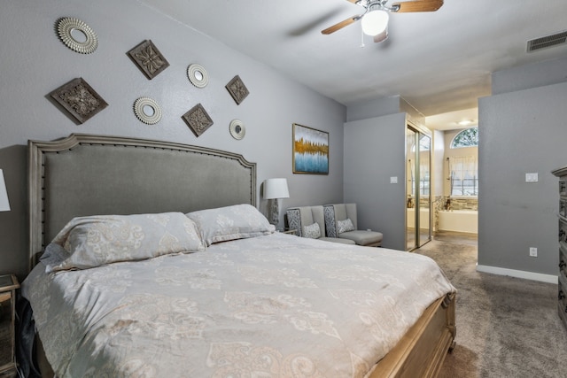 400 Crooked Ln, Mesquite, TX 75149 - bedroom with carpet flooring, baseboards, ensuite bathroom, and a ceiling fan