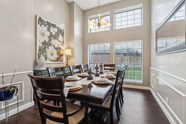 400 Crooked Ln, Mesquite, TX 75149 - dining room featuring healthy amount of natural light, a chandelier, and wood finished floors