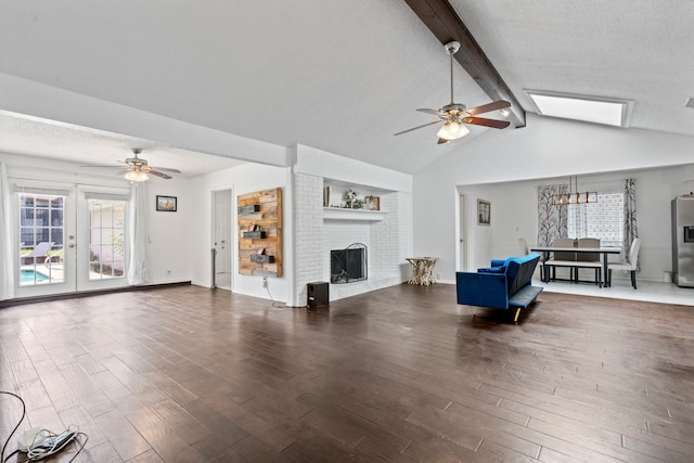 1426 Northridge Dr, Carrollton, TX 75006 - living room featuring a ceiling fan, wood finished floors, a brick fireplace, and baseboards