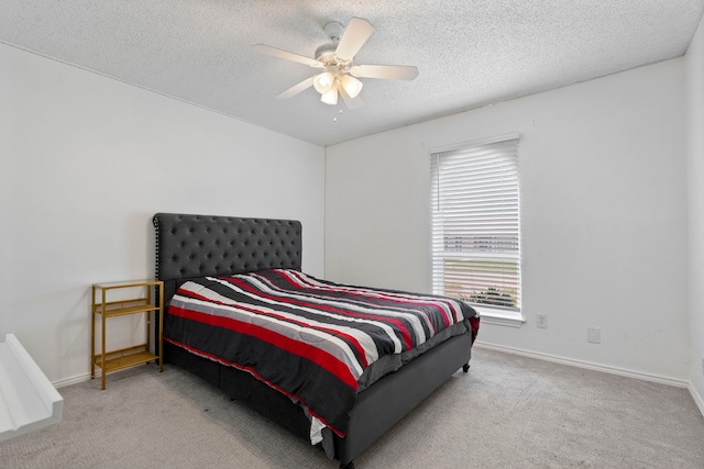 1426 Northridge Dr, Carrollton, TX 75006 - bedroom featuring carpet, a textured ceiling, baseboards, and a ceiling fan