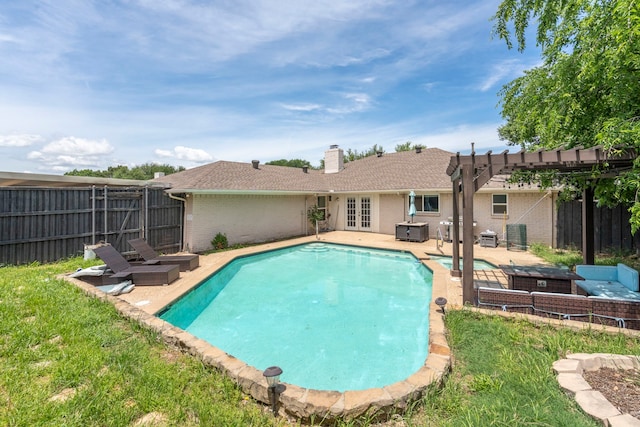 1426 Northridge Dr, Carrollton, TX 75006 - view of pool featuring fence, french doors, a patio, and a pool with connected hot tub