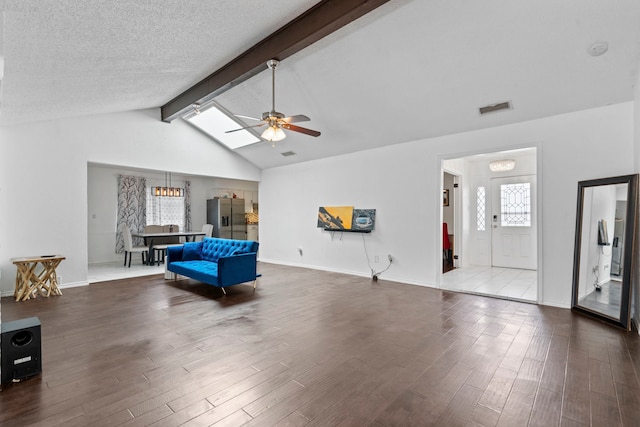 1426 Northridge Dr, Carrollton, TX 75006 - living area with ceiling fan, dark wood-type flooring, baseboards, a chandelier, and a textured ceiling