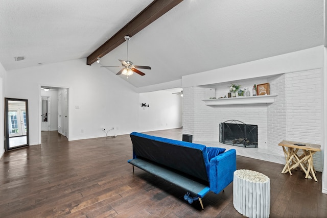 1426 Northridge Dr, Carrollton, TX 75006 - living area featuring ceiling fan, hardwood / wood-style floors, a fireplace, baseboards, and a textured ceiling