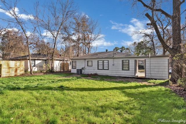 back of property featuring central air condition unit