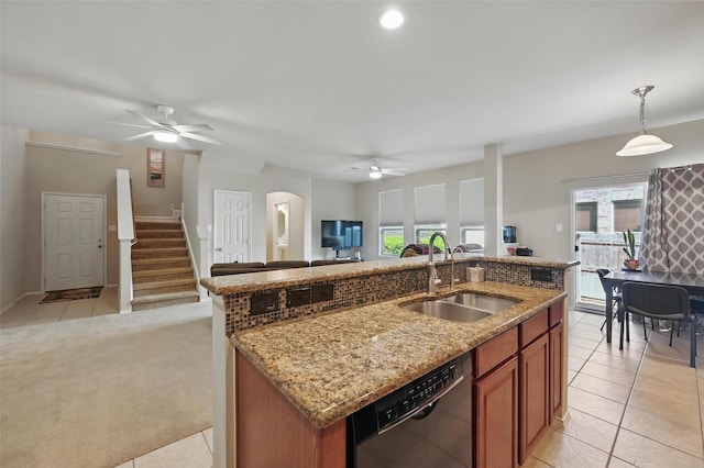 1418 Ravenwood Dr, Mansfield, TX 76063 - kitchen featuring a sink, black dishwasher, ceiling fan, open floor plan, and brown cabinetry