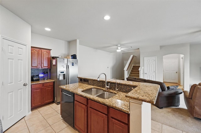 1418 Ravenwood Dr, Mansfield, TX 76063 - kitchen featuring a sink, dishwasher, open floor plan, light tile patterned floors, and stainless steel refrigerator with ice dispenser