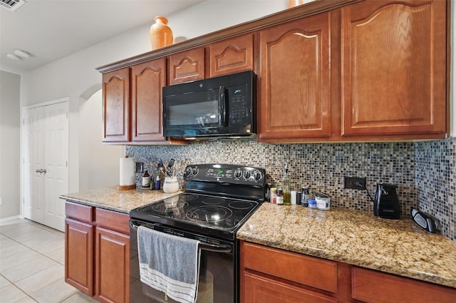 1418 Ravenwood Dr, Mansfield, TX 76063 - kitchen with black appliances, light tile patterned floors, light stone counters, and backsplash