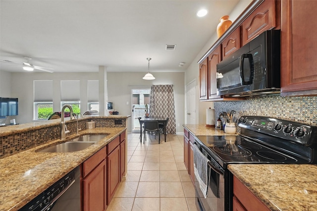 1418 Ravenwood Dr, Mansfield, TX 76063 - kitchen featuring black appliances, a sink, backsplash, and light stone counters