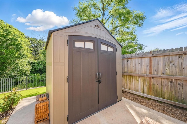 1418 Ravenwood Dr, Mansfield, TX 76063 - view of shed featuring a fenced backyard