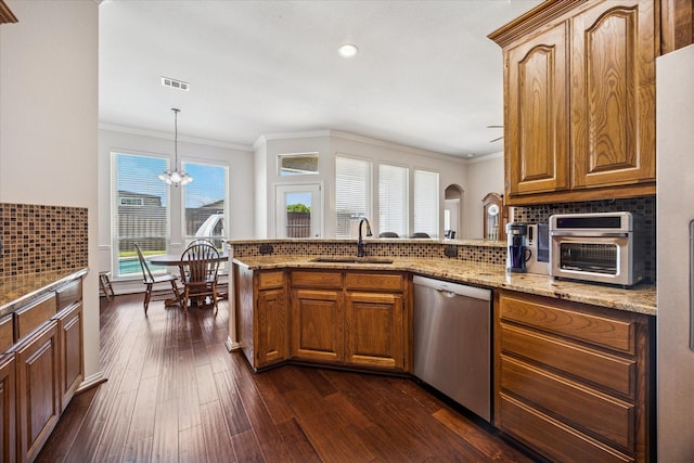 kitchen featuring stainless steel dishwasher, a sink, tasteful backsplash, crown molding, and light stone countertops