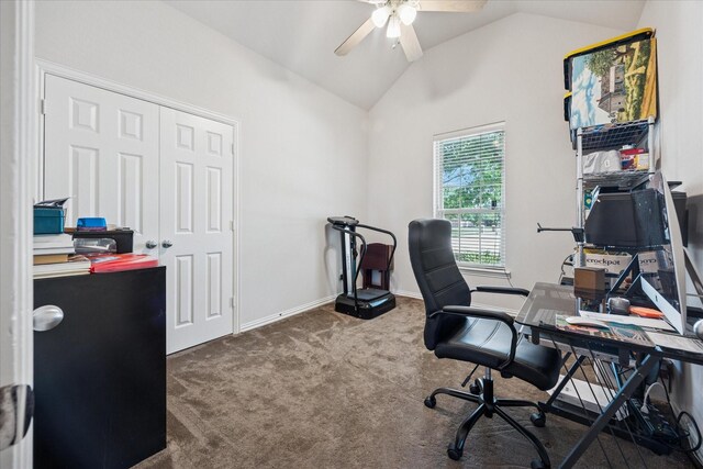 office with a ceiling fan, lofted ceiling, carpet floors, and baseboards
