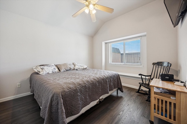 bedroom with vaulted ceiling, wood finished floors, baseboards, and ceiling fan