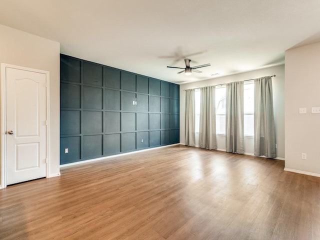 3305 Brentwood Cv, Forney, TX 75126 - empty room featuring ceiling fan, light wood-style flooring, and baseboards