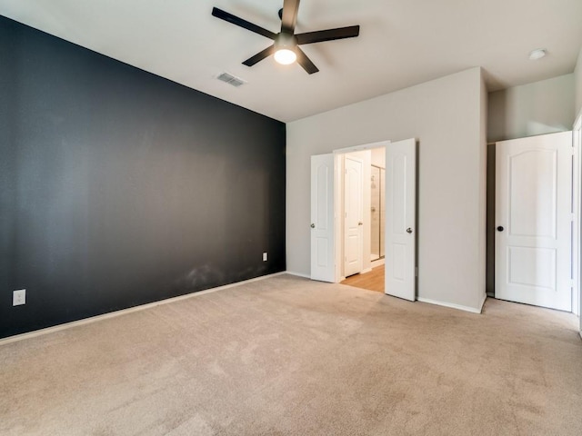 3305 Brentwood Cv, Forney, TX 75126 - unfurnished bedroom featuring light colored carpet, baseboards, and a ceiling fan