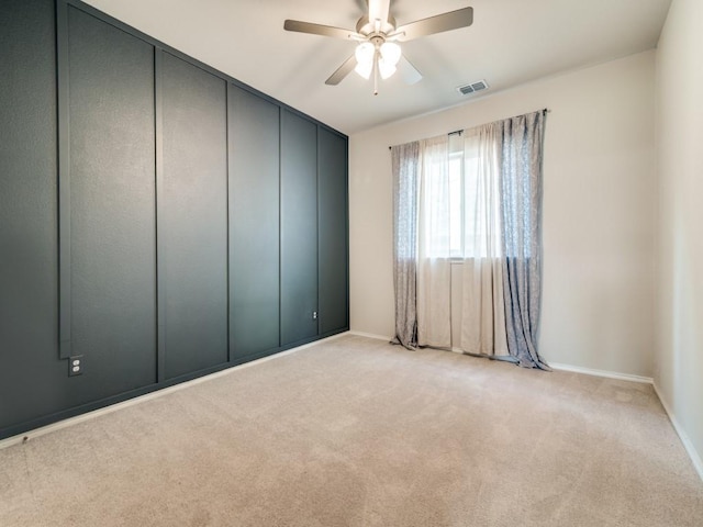 3305 Brentwood Cv, Forney, TX 75126 - unfurnished room with ceiling fan, light carpet, and baseboards