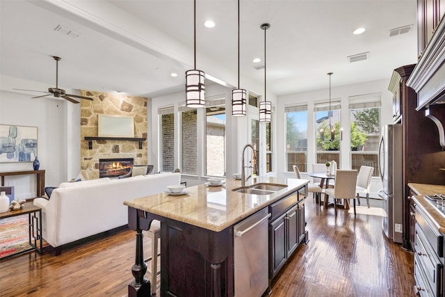 901 Clear Water Dr, Allen, TX 75013 - kitchen with a sink, appliances with stainless steel finishes, dark wood-style floors, ceiling fan, and recessed lighting