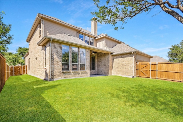 901 Clear Water Dr, Allen, TX 75013 - back of house featuring brick siding, a gate, a chimney, a ceiling fan, and a shingled roof