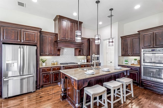 901 Clear Water Dr, Allen, TX 75013 - kitchen featuring stainless steel appliances, dark wood-style flooring, a sink, backsplash, and recessed lighting