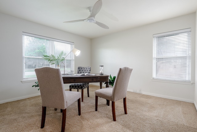 5820 Forest Ln, Dallas, TX 75230 - dining space with light carpet, a ceiling fan, a desk, and baseboards