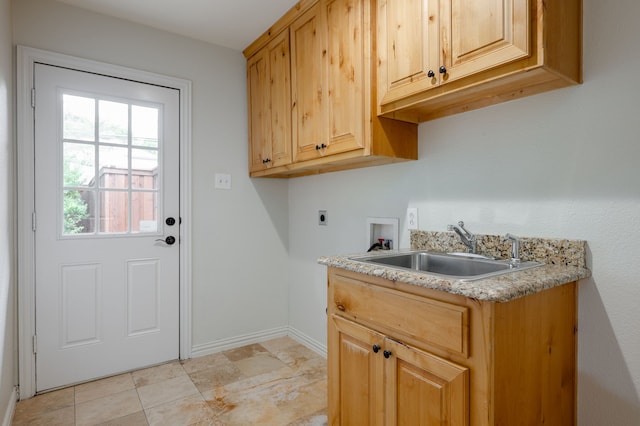 5820 Forest Ln, Dallas, TX 75230 - laundry area featuring hookup for an electric dryer, washer hookup, cabinet space, and baseboards