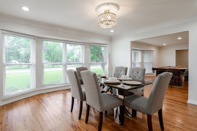 5820 Forest Ln, Dallas, TX 75230 - dining space with plenty of natural light, light wood finished floors, a chandelier, recessed lighting, and crown molding