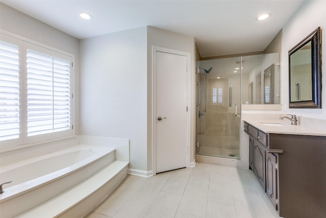 10101 Apple Creek Dr, Dallas, TX 75243 - bathroom featuring healthy amount of natural light, vanity, a shower stall, and recessed lighting