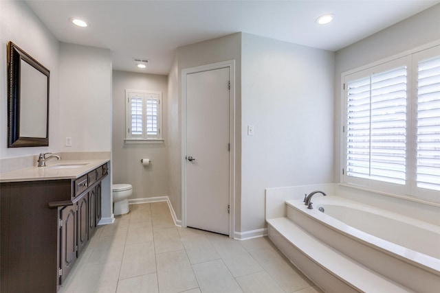 10101 Apple Creek Dr, Dallas, TX 75243 - full bathroom featuring toilet, baseboards, vanity, a garden tub, and recessed lighting