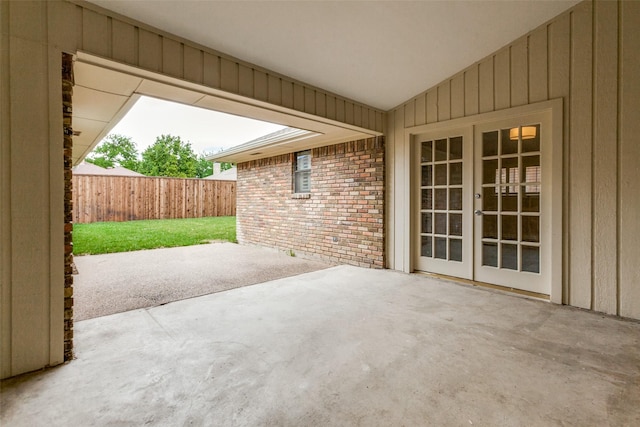 10101 Apple Creek Dr, Dallas, TX 75243 - view of patio / terrace with french doors and fence