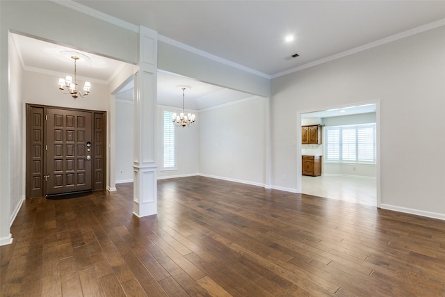 10101 Apple Creek Dr, Dallas, TX 75243 - unfurnished living room with a chandelier, dark wood finished floors, ornate columns, baseboards, and ornamental molding