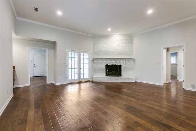 10101 Apple Creek Dr, Dallas, TX 75243 - unfurnished living room featuring dark wood-style flooring, crown molding, a fireplace, baseboards, and recessed lighting