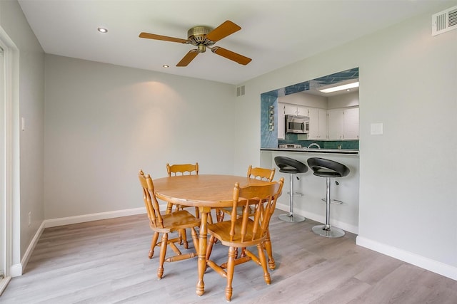 390 Driftwood Ct Unit 3B-1, Azle, TX 76020 - dining space with light wood finished floors, a ceiling fan, baseboards, and recessed lighting