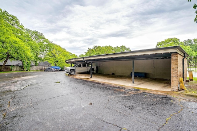 390 Driftwood Ct Unit 3B-1, Azle, TX 76020 - covered parking lot with fence