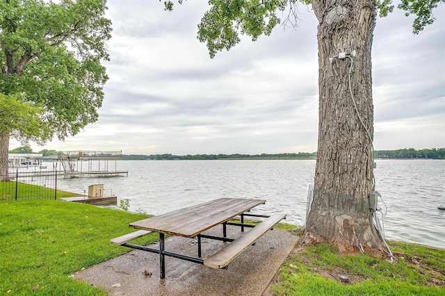 390 Driftwood Ct Unit 3B-1, Azle, TX 76020 - dock featuring a water view and a lawn