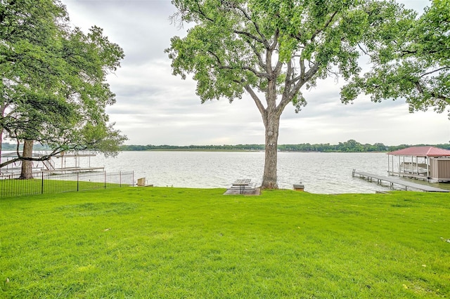 390 Driftwood Ct Unit 3B-1, Azle, TX 76020 - view of grassy yard featuring a dock, boat lift, and a water view