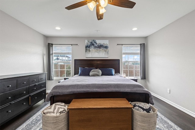 2104 Shane Ave, Fort Worth, TX 76134 - bedroom with baseboards, dark wood-style floors, multiple windows, a ceiling fan, and recessed lighting