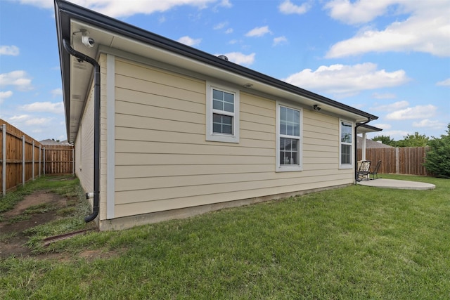 2104 Shane Ave, Fort Worth, TX 76134 - view of side of home featuring a patio area