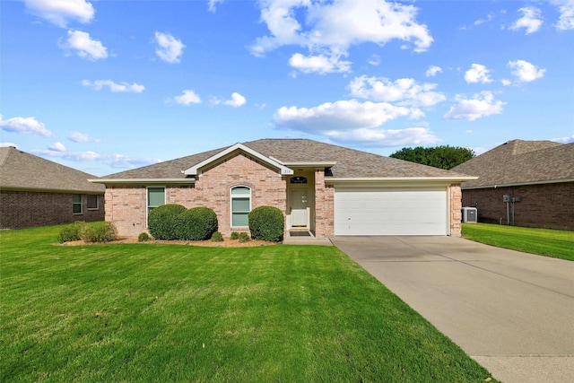 218 Whispering Dell Ln, Weatherford, TX 76085 - single story home with brick siding, a garage, concrete driveway, and a front lawn