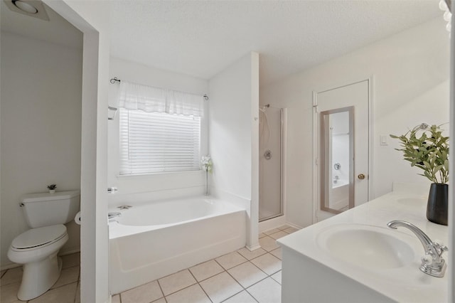 218 Whispering Dell Ln, Weatherford, TX 76085 - full bath with tile patterned floors, a garden tub, a stall shower, toilet, and double vanity